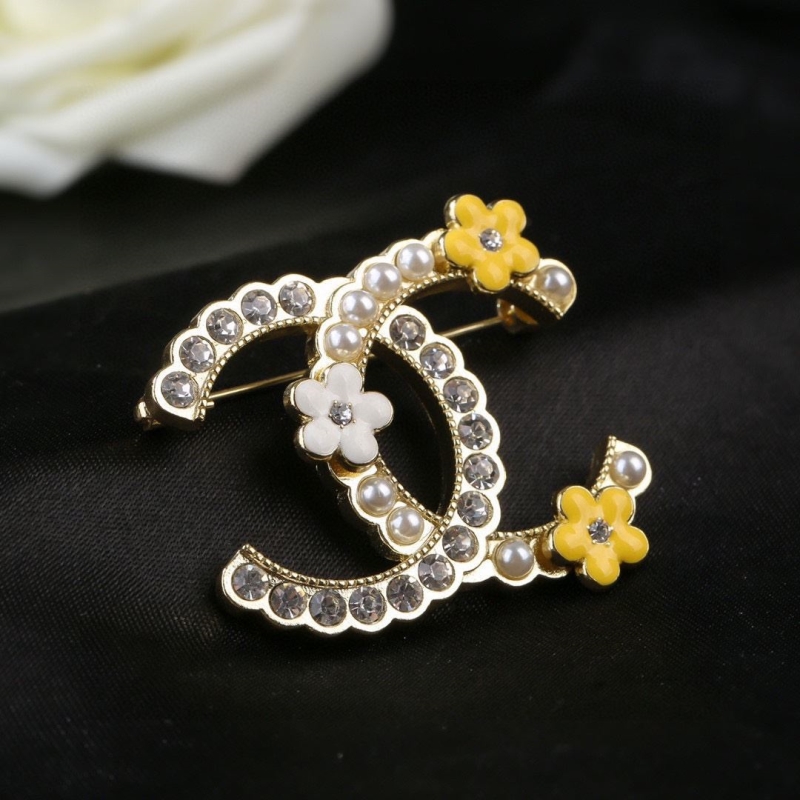 Ch*el brooches